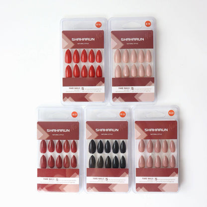 Five sets of SHAHARUN natural style fake nails in red, nude, maroon, black, and pink shades on white background
