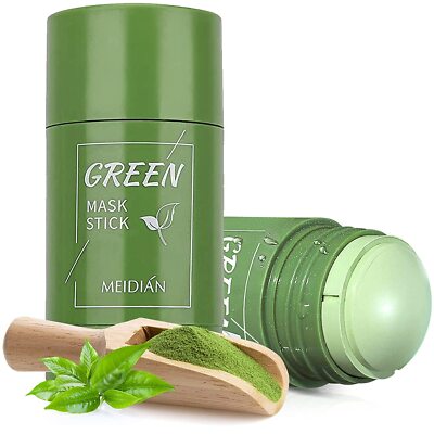 Green mask stick by Meidian with natural green tea powder and leaves on white background
